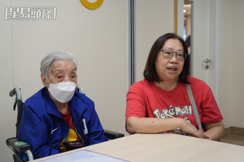 102歲區婆婆與照顧者盧小姐。